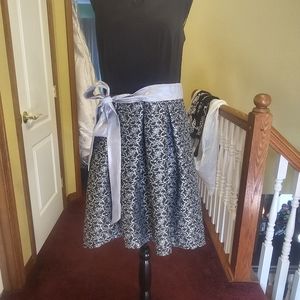 Black high low dress with silver accents. Size 10